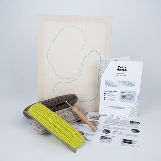 Pebbles II punch needle kit with printed monk's cloth canvas, detailed instructions with photos, yarn, punch needle and threader.